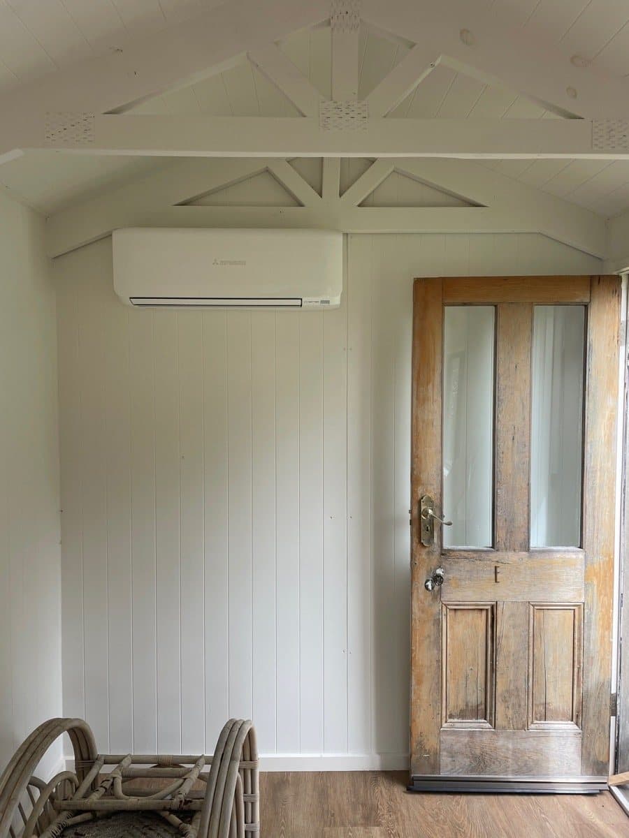 Split head under a pitched ceiling