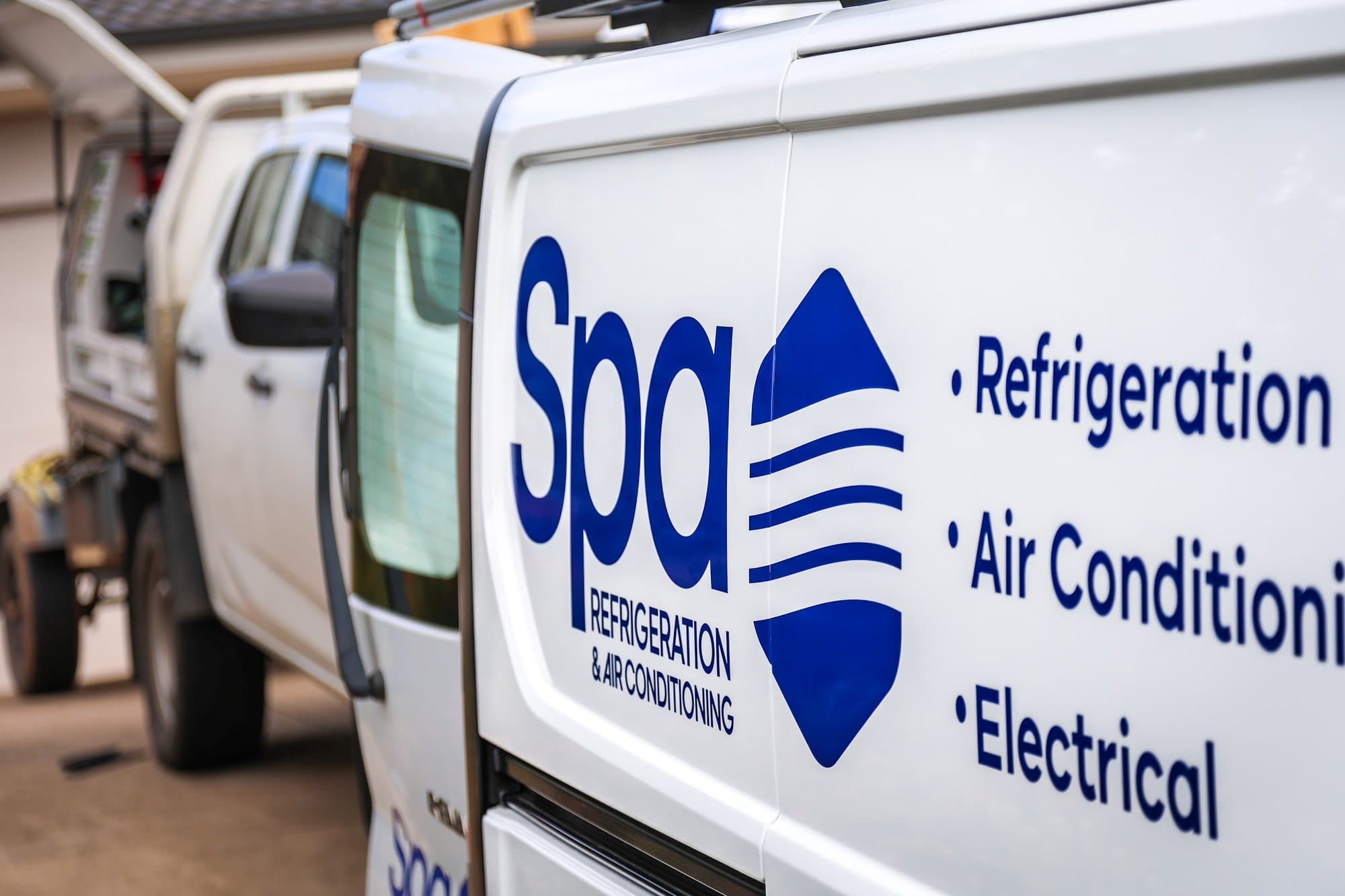 The SPA Refrigeration & Air Conditioning van on site at a job